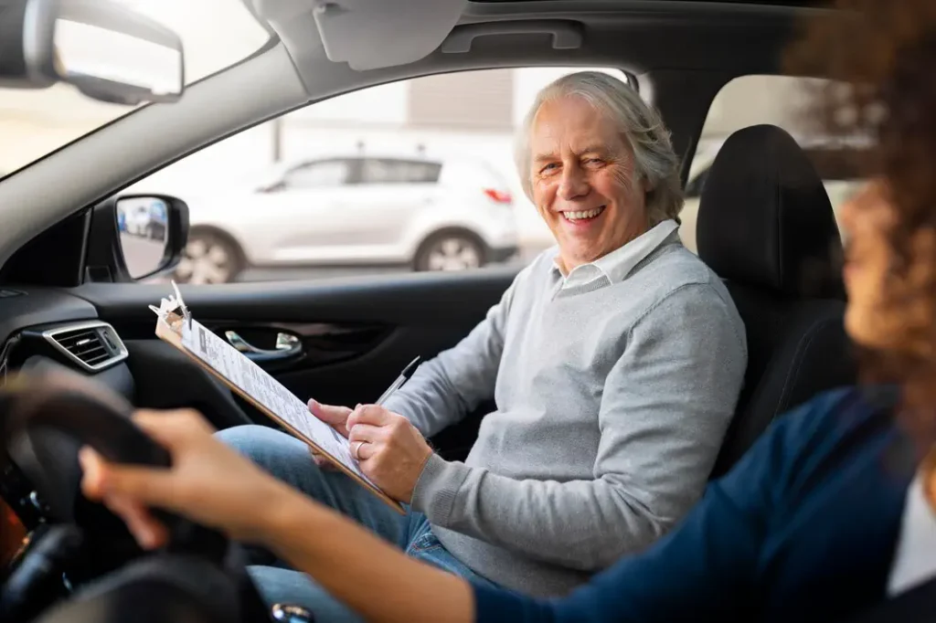 A driving instructor supervises a lesson, Driving School in Crewe.